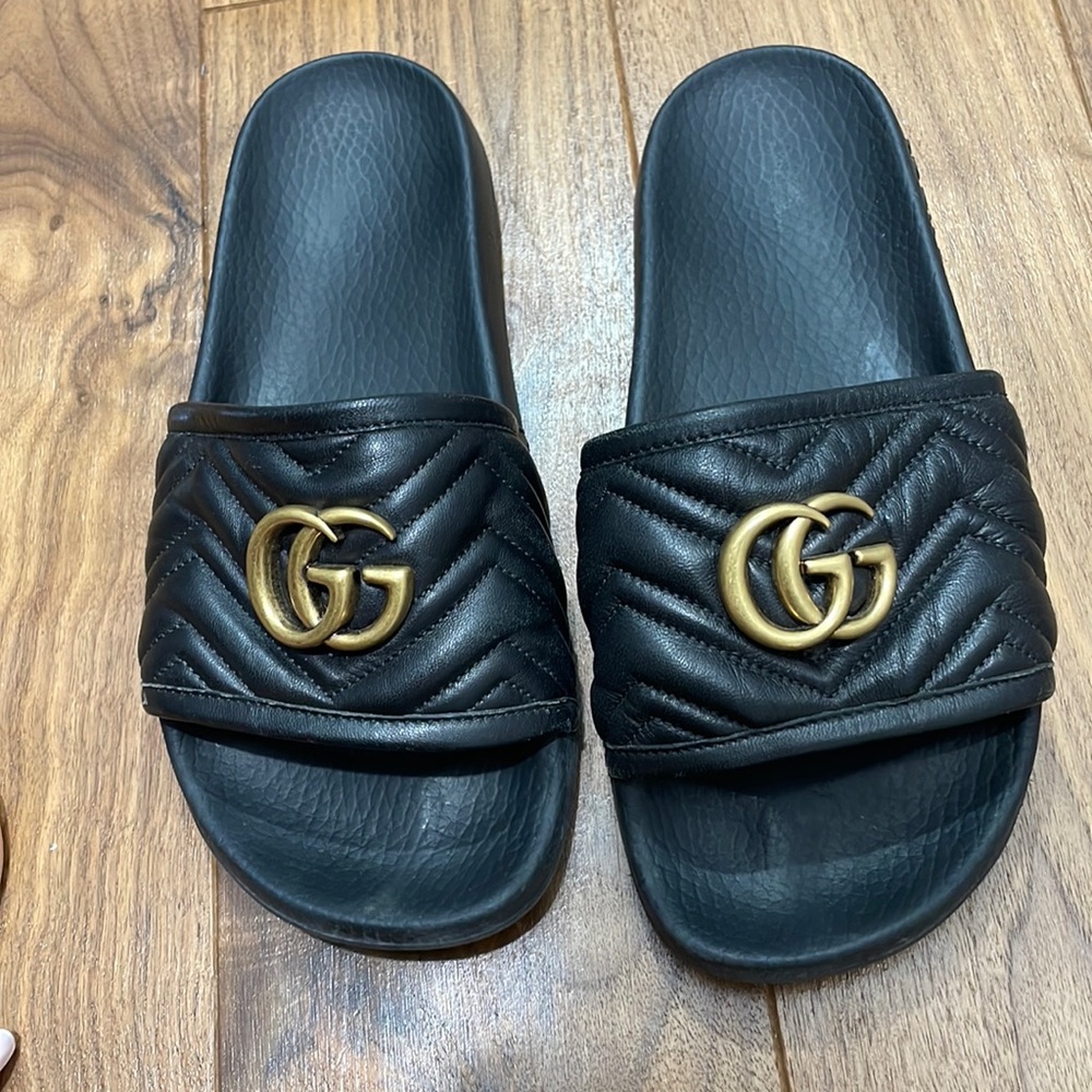 Gucci logo leather and rubber slides